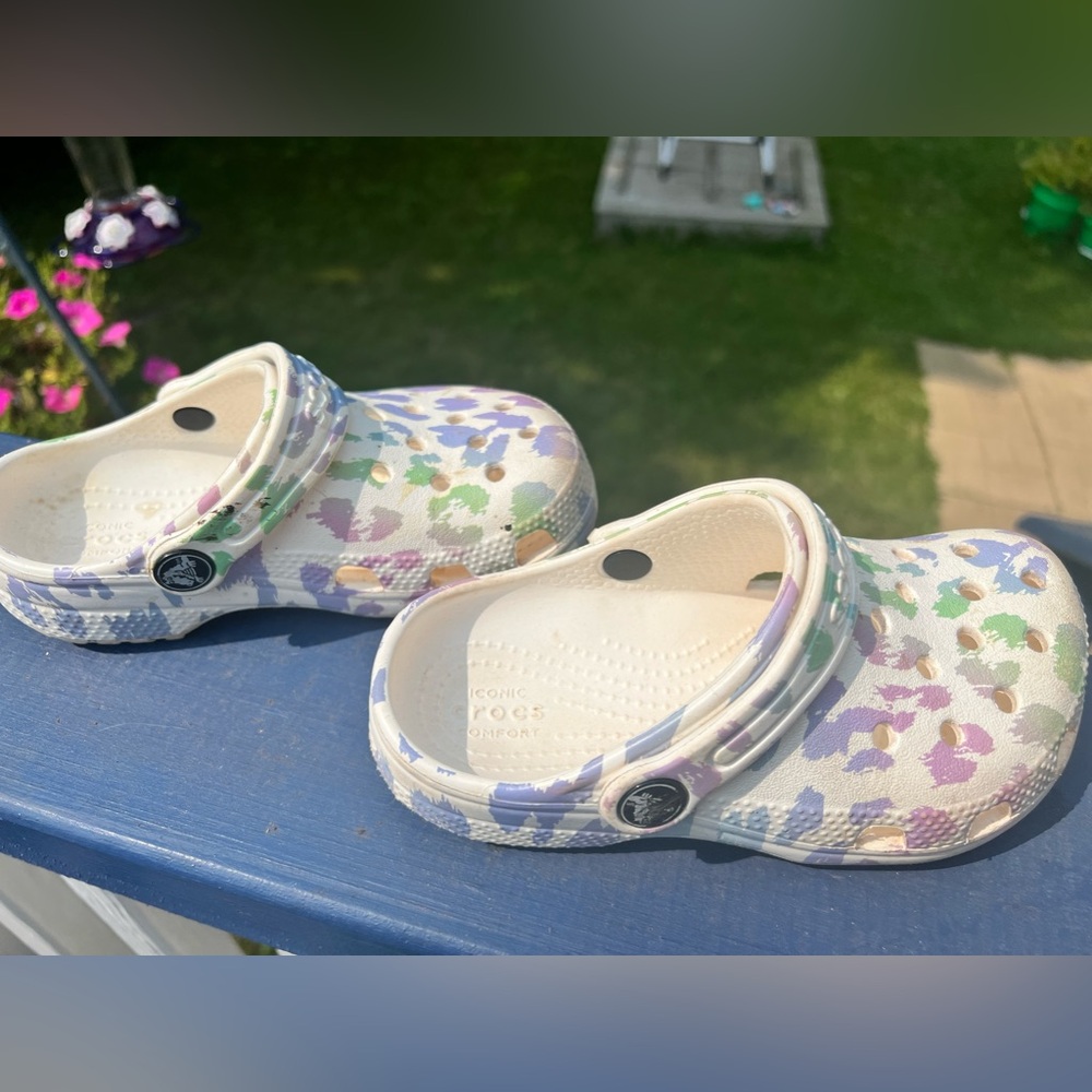 Toddler size 10 girl leopard crocs barely worn would look brand new if wiped